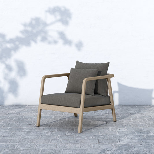 Numa Outdoor Chair - Washed Brown by Four Hands. Made from 100% olefin, solid fsc®-certified teak, 100% polypropylene in a coastal style.