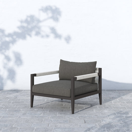 Sherwood Outdoor Chair, Bronze by Four Hands in bronze. Made from 100% olefin, aluminum, 100% polypropylene in a modern style.