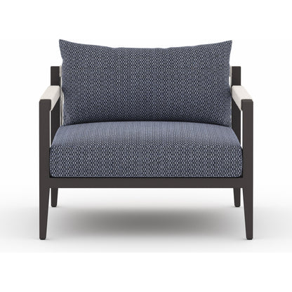 Sherwood Outdoor Chair, Bronze by Four Hands in bronze. Made from 100% olefin, aluminum, 100% polypropylene in a modern style.