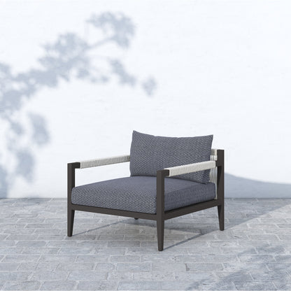 Sherwood Outdoor Chair, Bronze by Four Hands in bronze. Made from 100% olefin, aluminum, 100% polypropylene in a modern style.