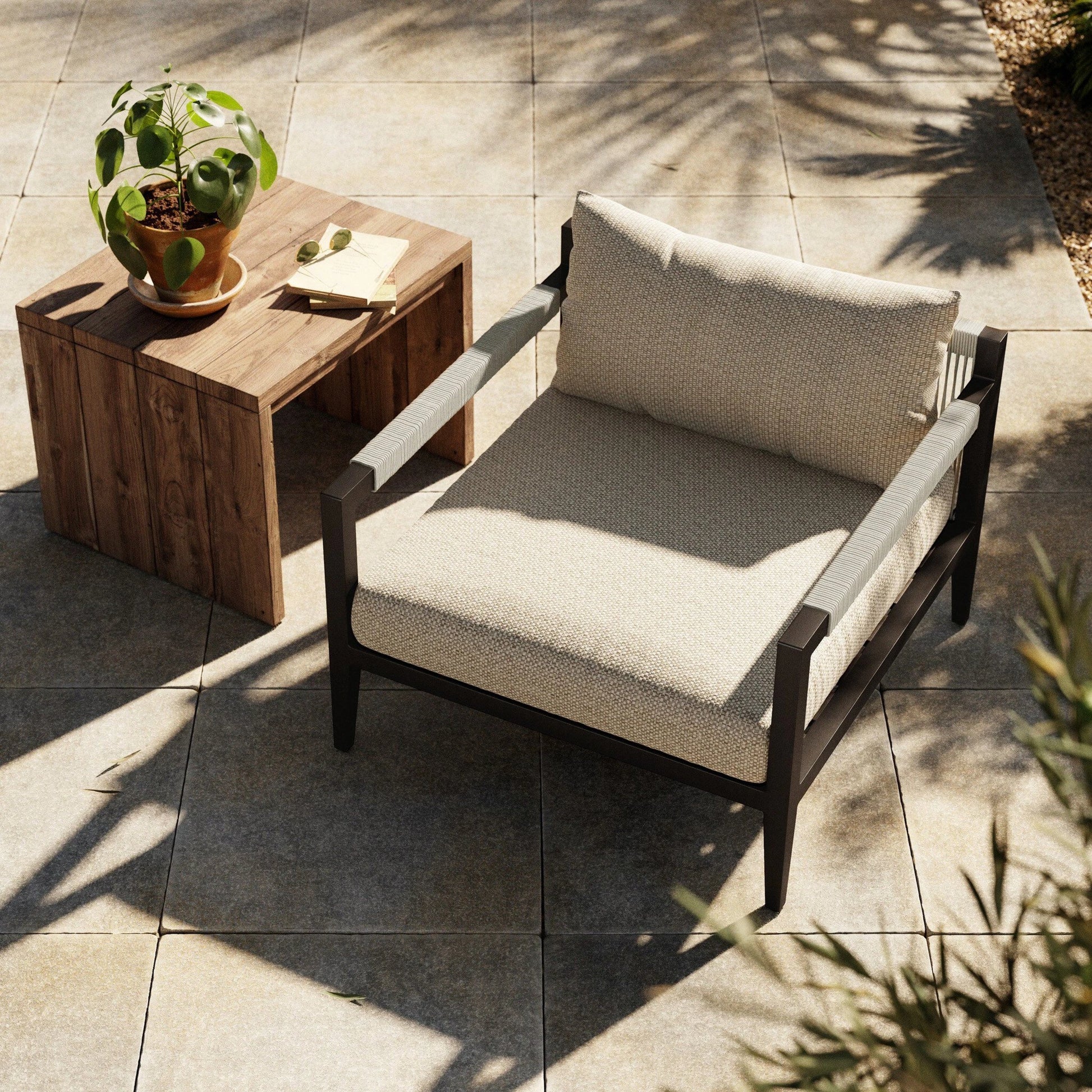 Sherwood Outdoor Chair, Bronze by Four Hands in bronze. Made from 100% olefin, aluminum, 100% polypropylene in a modern style.