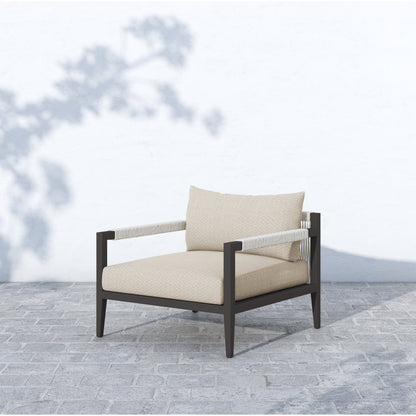 Sherwood Outdoor Chair, Bronze by Four Hands in bronze. Made from 100% olefin, aluminum, 100% polypropylene in a modern style.