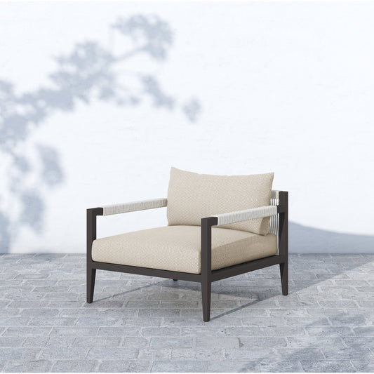 Sherwood Outdoor Chair, Bronze by Four Hands in natural ivory and bronze. Made from 100% olefin, aluminum, 100% polypropylene in a modern style.