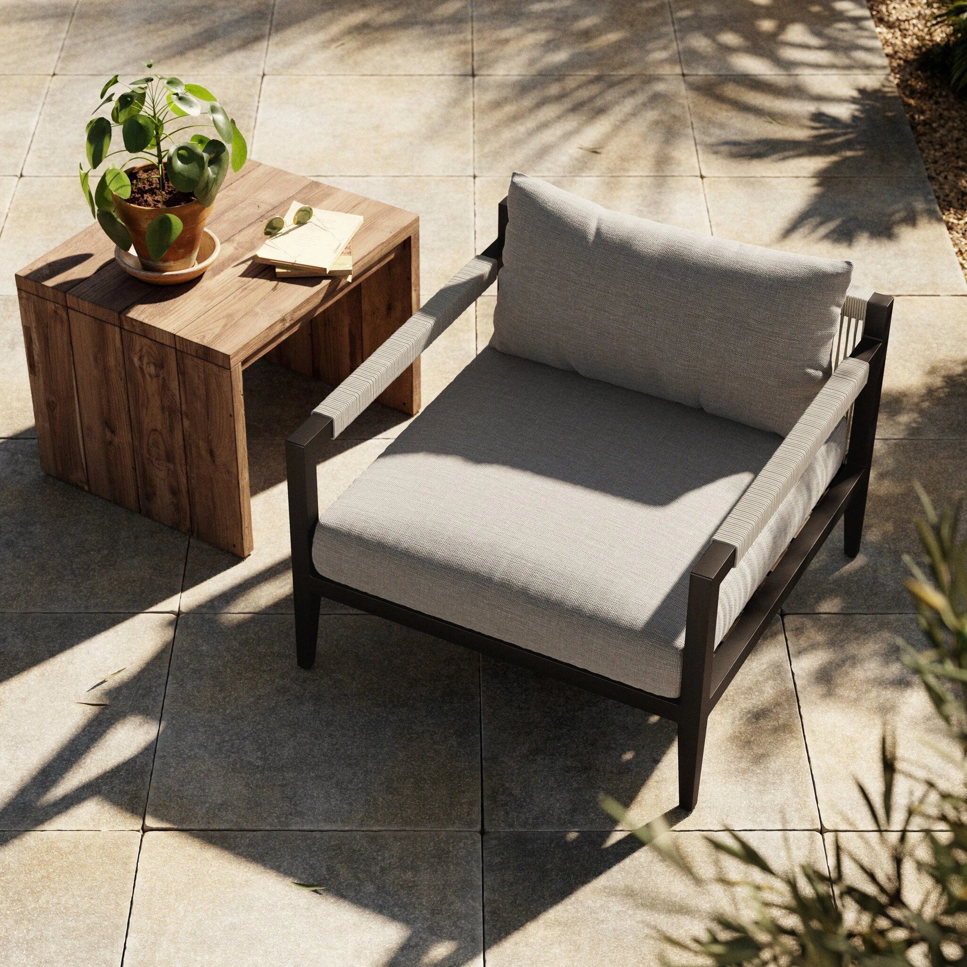 Sherwood Outdoor Chair, Bronze by Four Hands in bronze. Made from 100% olefin, aluminum, 100% polypropylene in a modern style.