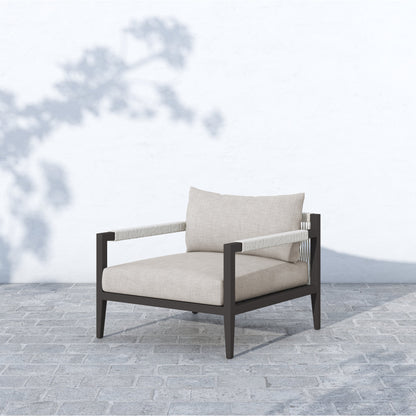 Sherwood Outdoor Chair, Bronze by Four Hands in bronze. Made from 100% olefin, aluminum, 100% polypropylene in a modern style.