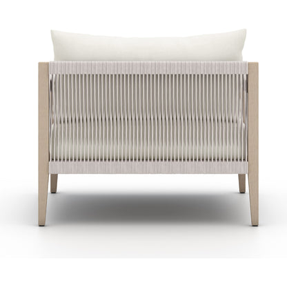 Sherwood Outdoor Chair, Washed Brown by Four Hands. Made from 100% olefin, solid fsc®-certified teak, 100% polypropylene in a coastal style.