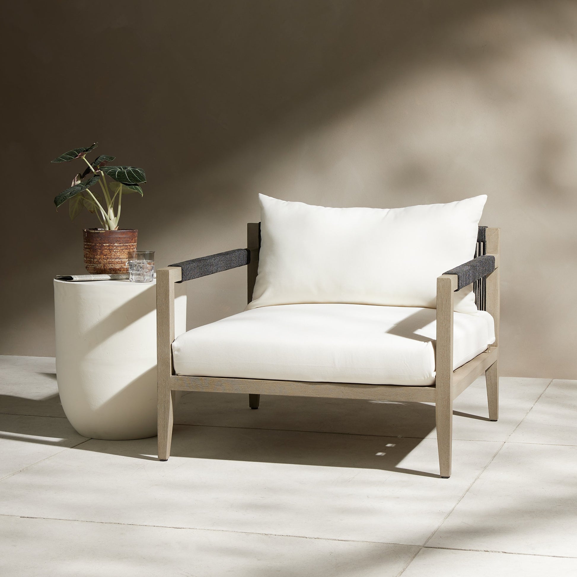 Sherwood Outdoor Chair, Weathered Grey by Four Hands. Made from 100% olefin, solid fsc®-certified teak, 100% polypropylene in a coastal style.