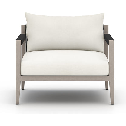 Sherwood Outdoor Chair, Weathered Grey by Four Hands. Made from 100% olefin, solid fsc®-certified teak, 100% polypropylene in a coastal style.
