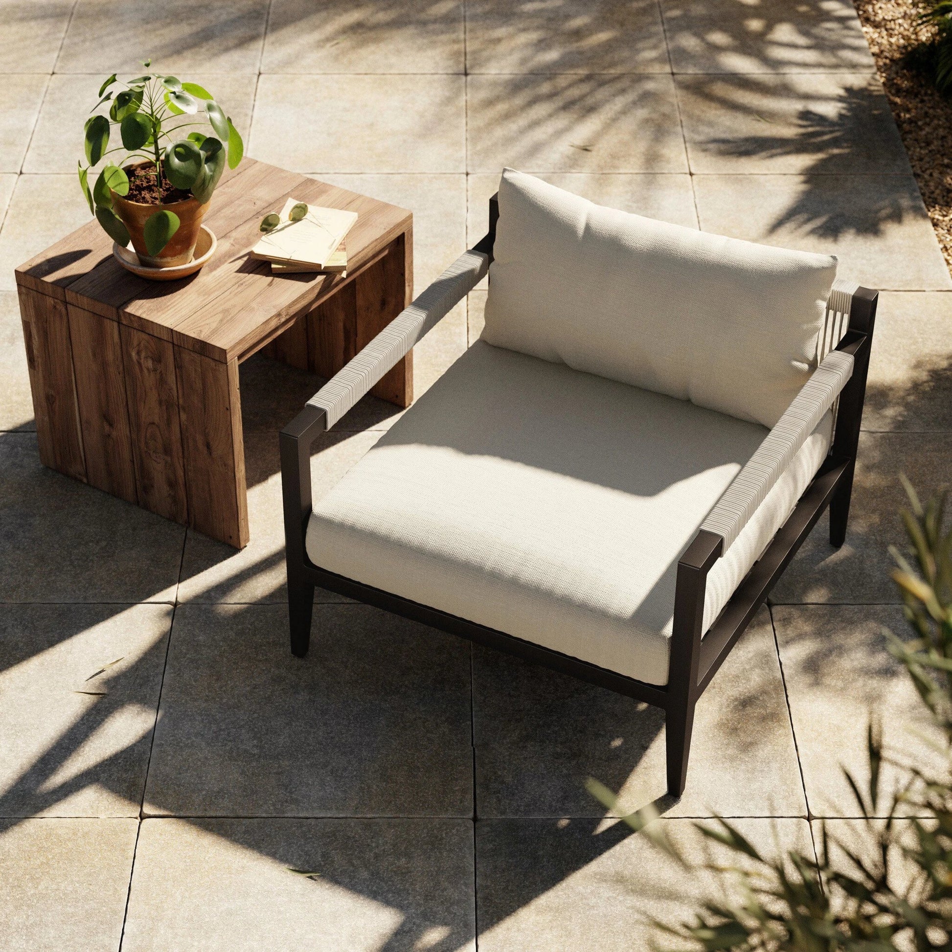 Sherwood Outdoor Chair, Bronze by Four Hands in bronze. Made from 100% olefin, aluminum, 100% polypropylene in a modern style.