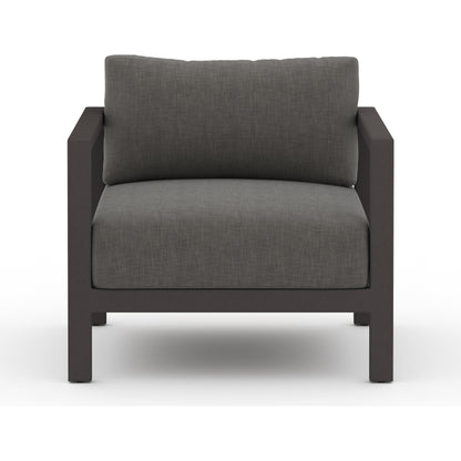 Sonoma Outdoor Chair by Four Hands. Made from 100% olefin, aluminum, 100% polypropylene in a coastal style.