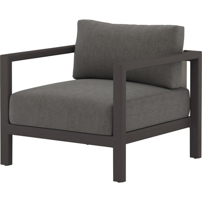 Sonoma Outdoor Chair by Four Hands. Made from 100% olefin, aluminum, 100% polypropylene in a coastal style.