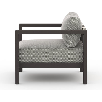 Sonoma Outdoor Chair by Four Hands. Made from 100% olefin, aluminum, 100% polypropylene in a coastal style.