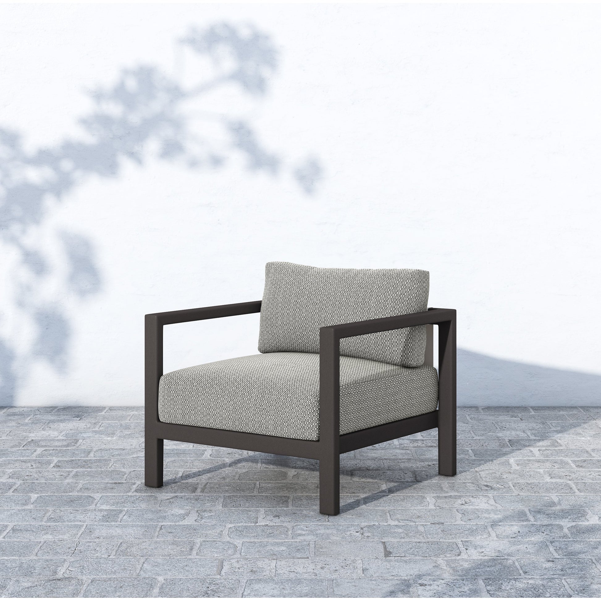 Sonoma Outdoor Chair by Four Hands. Made from 100% olefin, aluminum, 100% polypropylene in a coastal style.