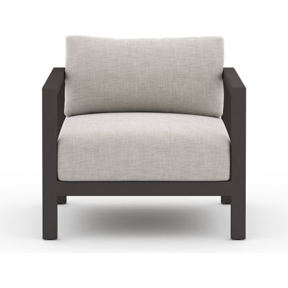 Sonoma Outdoor Chair by Four Hands. Made from 100% olefin, aluminum, 100% polypropylene in a coastal style.