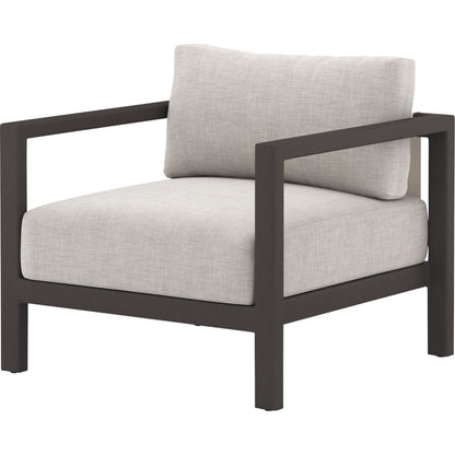 Sonoma Outdoor Chair by Four Hands. Made from 100% olefin, aluminum, 100% polypropylene in a coastal style.