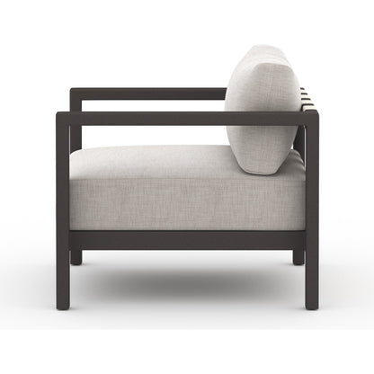 Sonoma Outdoor Chair by Four Hands. Made from 100% olefin, aluminum, 100% polypropylene in a coastal style.