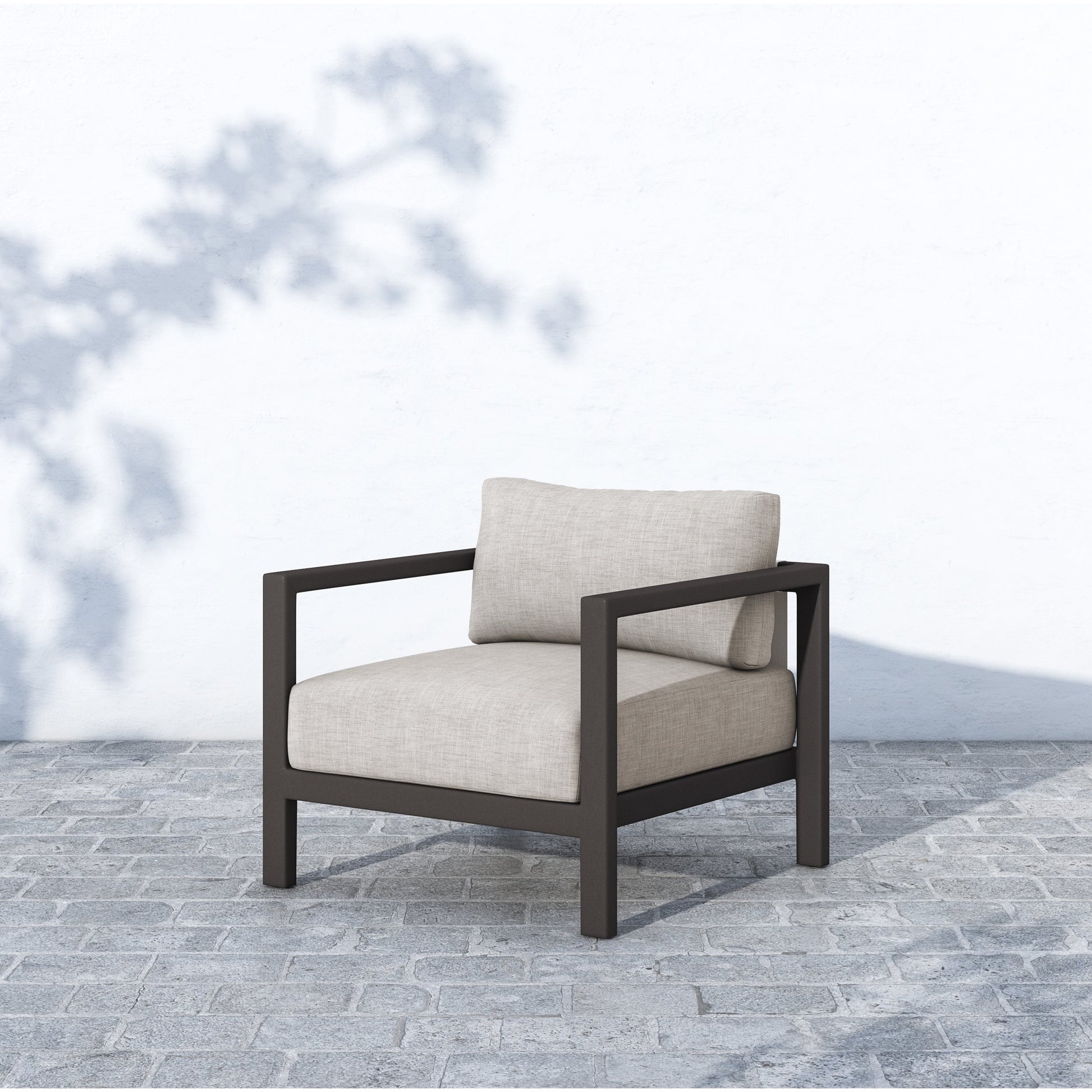 Sonoma Outdoor Chair by Four Hands. Made from 100% olefin, aluminum, 100% polypropylene in a coastal style.