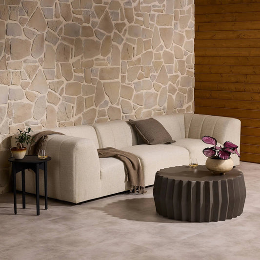 Gwen Outdoor 3-Piece Sectional by Four Hands in faye sand. Made from 100% olefin, 91% polyurethane foam pad, 9% polyester fiber batting, 100% polypropylene in a modern style.