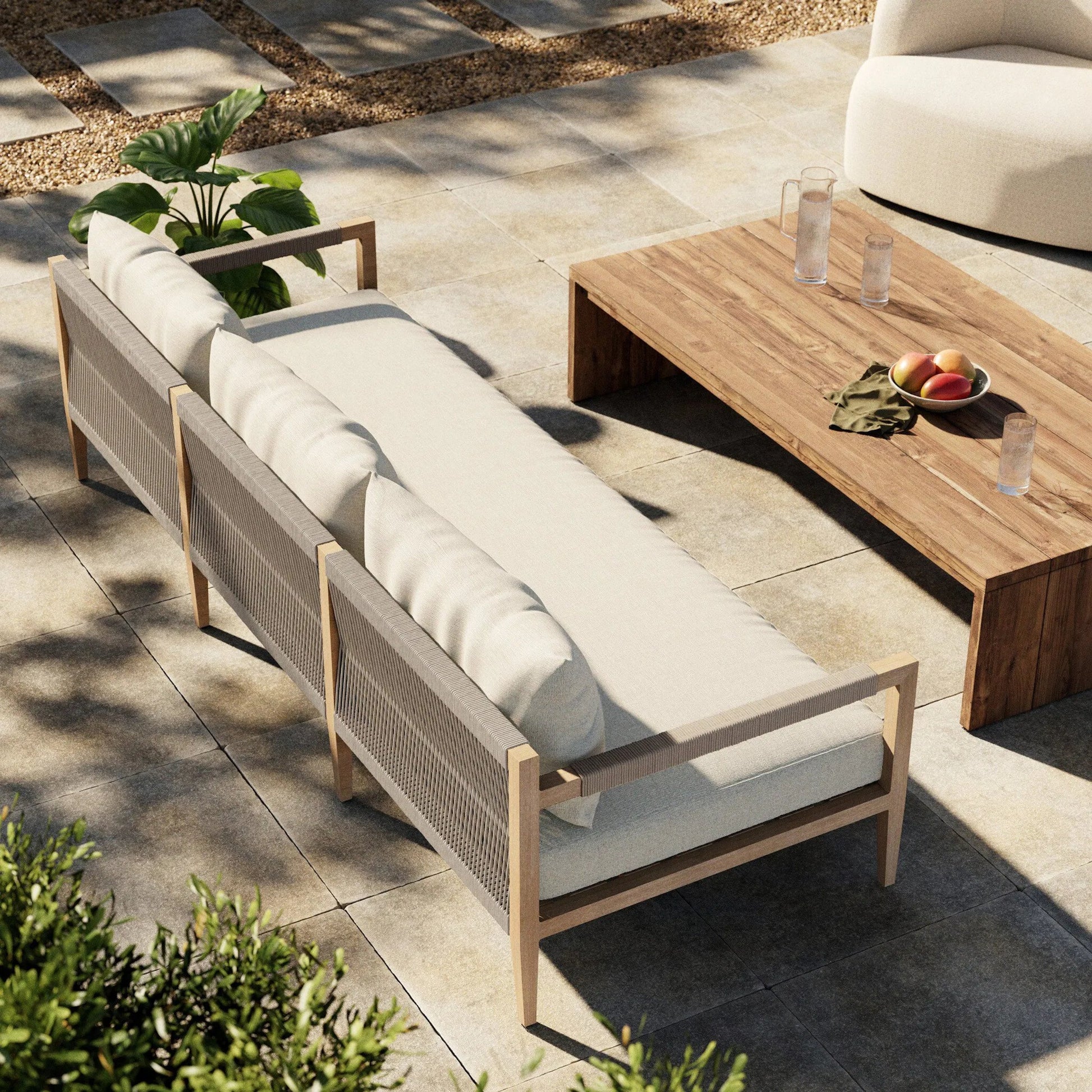 Sherwood Outdoor Sofa, Washed Brown by Four Hands. Made from 100% olefin, solid fsc®-certified teak, 100% polypropylene in a coastal style.