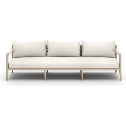 Sherwood Outdoor Sofa, Washed Brown by Four Hands. Made from 100% olefin, solid fsc®-certified teak, 100% polypropylene in a coastal style.
