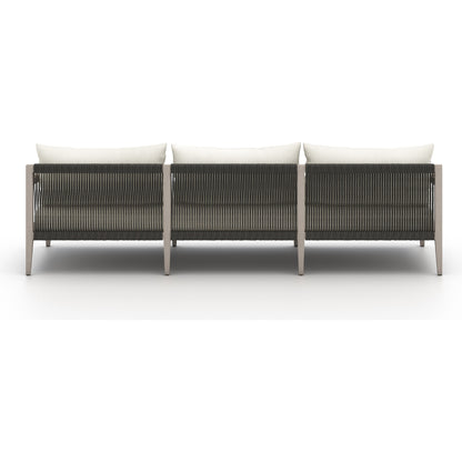 Sherwood Outdoor Sofa, Weathered Grey by Four Hands. Made from 100% olefin, solid fsc®-certified teak, 100% polypropylene in a coastal style.