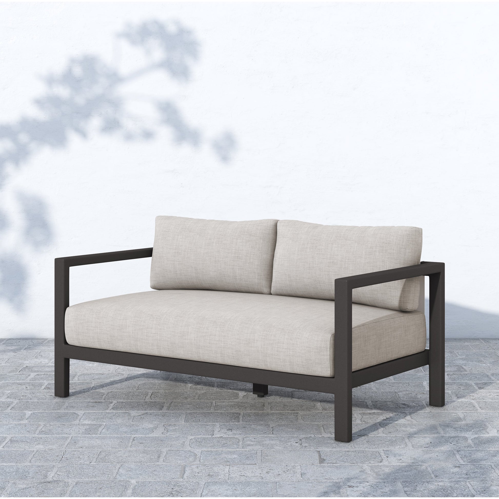 Sonoma Outdoor Sofa by Four Hands. Made from unique in a coastal style.