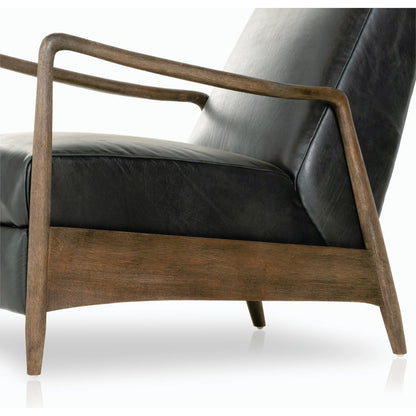 Braden Recliner by Four Hands in dakota black, rubbed sienna brown. Made from top grain leather, solid parawood, 100% polyester in a modern style.