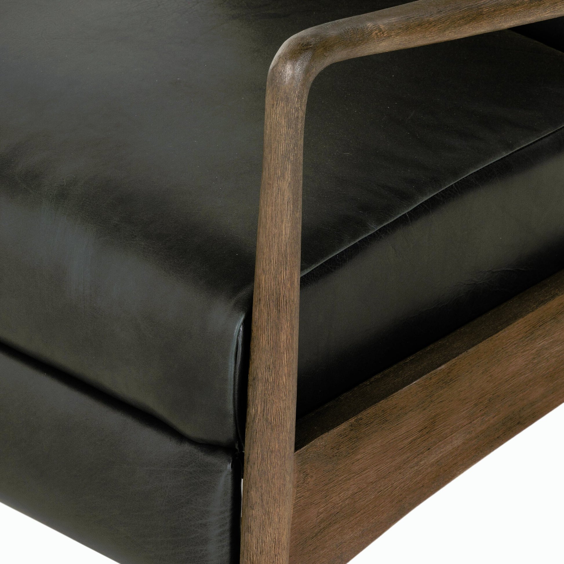 Braden Recliner by Four Hands in dakota black, rubbed sienna brown. Made from top grain leather, solid parawood, 100% polyester in a modern style.