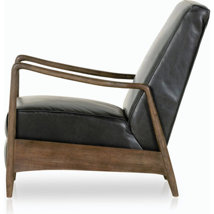 Braden Recliner by Four Hands in dakota black, rubbed sienna brown. Made from top grain leather, solid parawood, 100% polyester in a modern style.