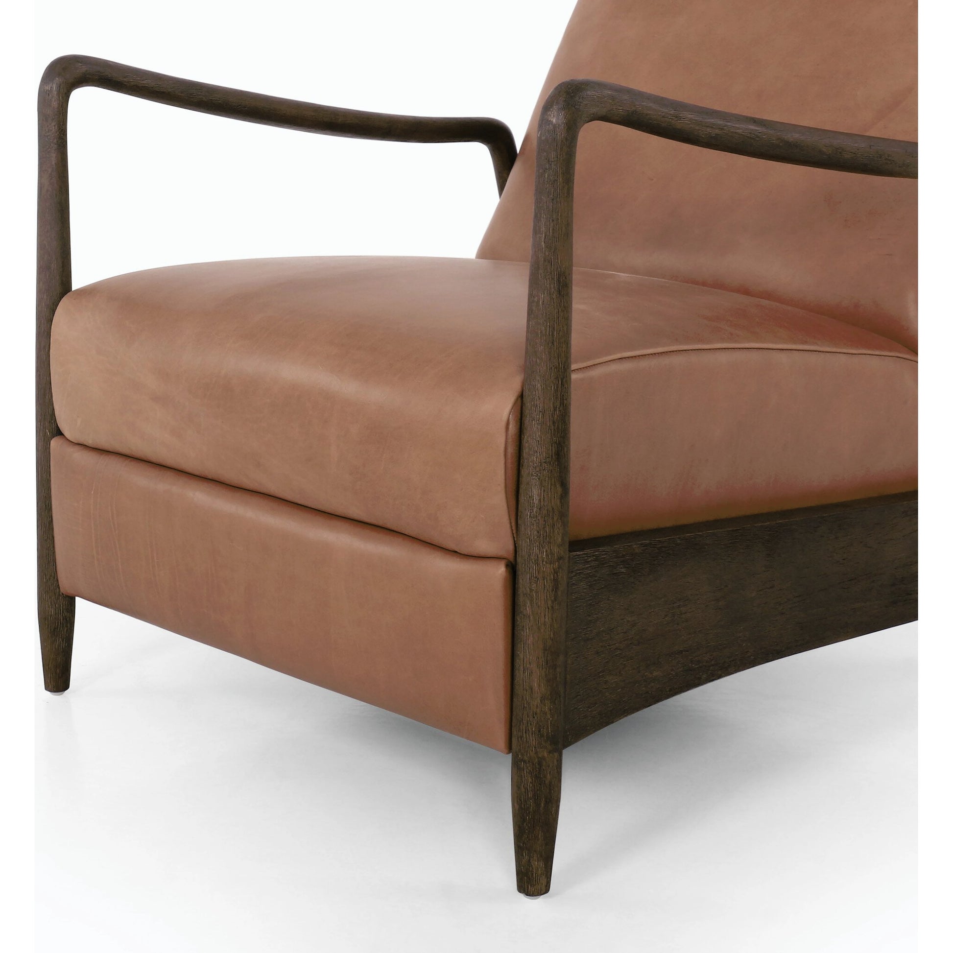 Braden Recliner by Four Hands in dakota black, rubbed sienna brown. Made from top grain leather, solid parawood, 100% polyester in a modern style.