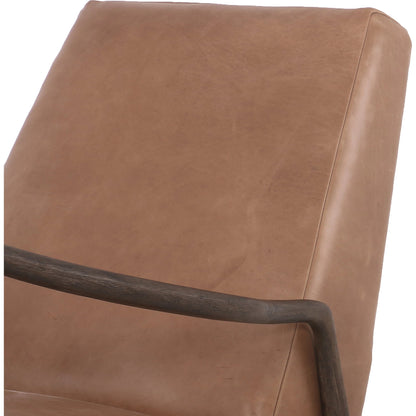 Braden Recliner by Four Hands in dakota black, rubbed sienna brown. Made from top grain leather, solid parawood, 100% polyester in a modern style.