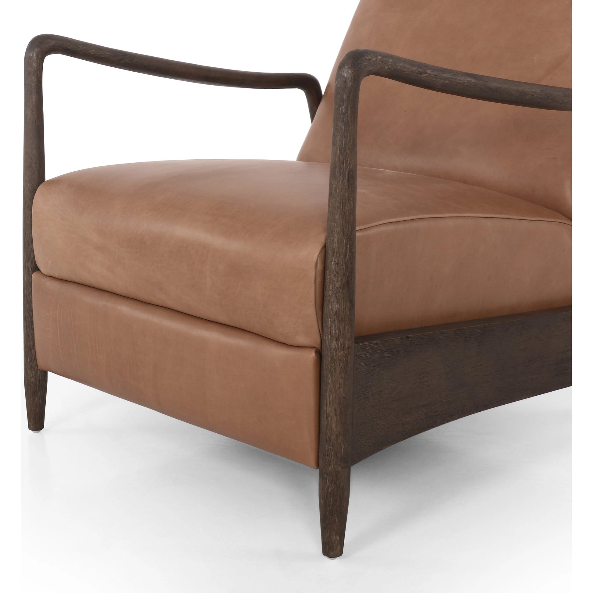 Braden Recliner by Four Hands in dakota black, rubbed sienna brown. Made from top grain leather, solid parawood, 100% polyester in a modern style.