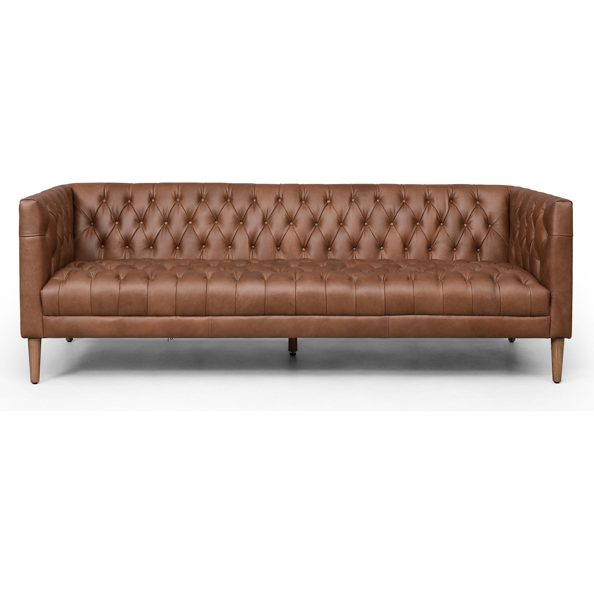 Williams Leather Sofa by Four Hands. Made from top grain leather, solid ash, 100% polyester in a rustic style.