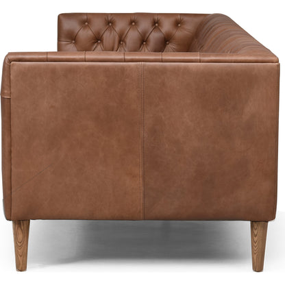 Williams Leather Sofa by Four Hands. Made from top grain leather, solid ash, 100% polyester in a rustic style.