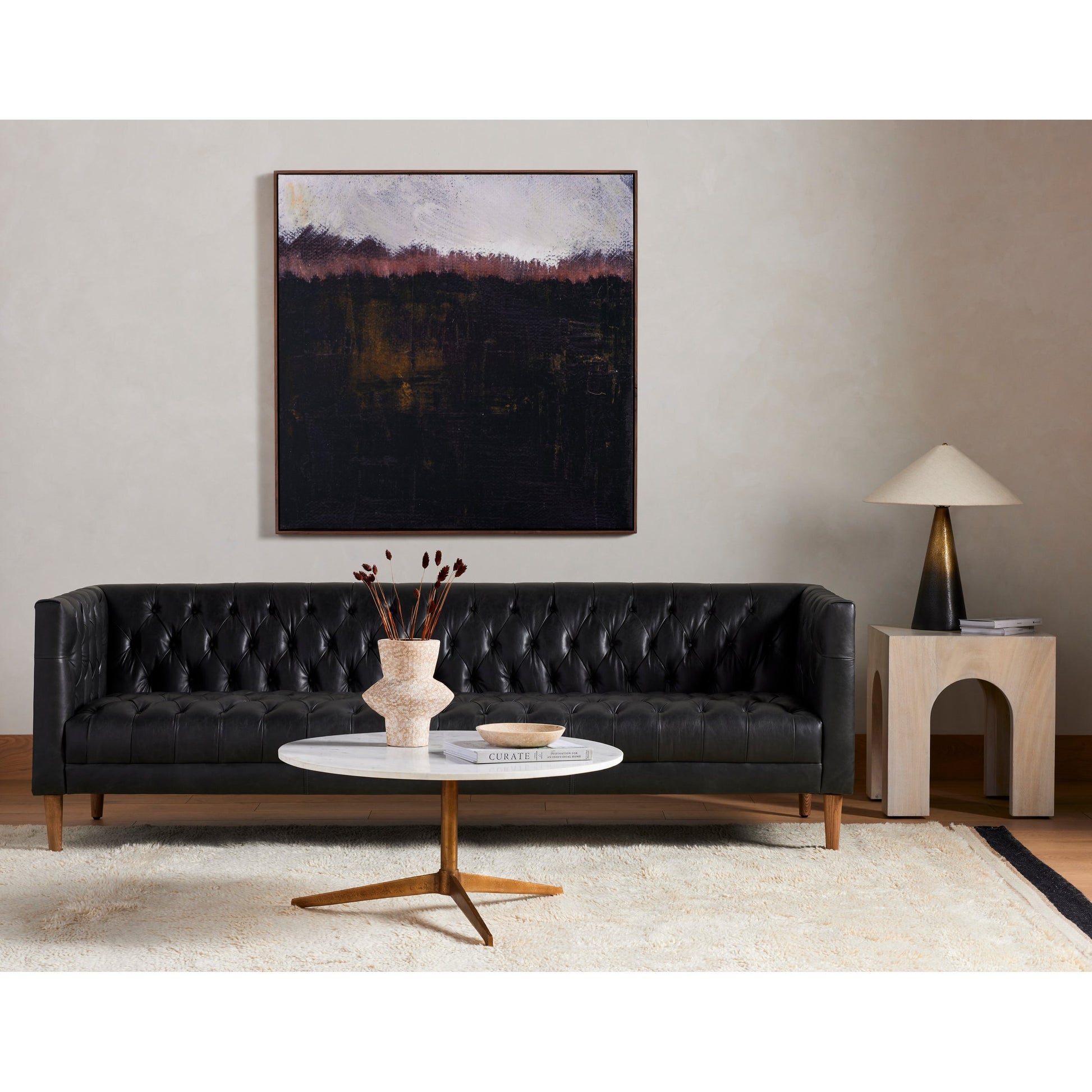 Williams Leather Sofa by Four Hands. Made from top grain leather, solid ash, 100% polyester in a rustic style.