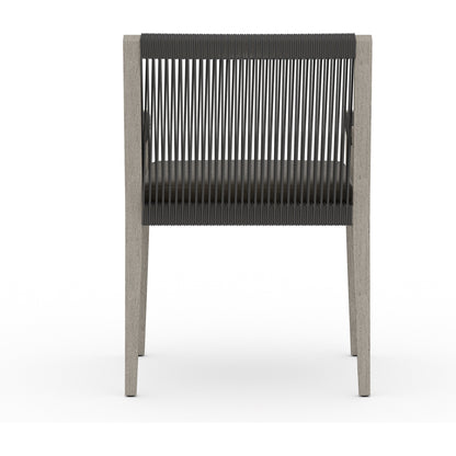 Sherwood Outdoor Dining Armchair, Weathered Grey by Four Hands. Made from 100% olefin, solid fsc®-certified teak, 100% polypropylene in a coastal style.