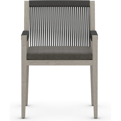 Sherwood Outdoor Dining Armchair, Weathered Grey by Four Hands. Made from 100% olefin, solid fsc®-certified teak, 100% polypropylene in a coastal style.