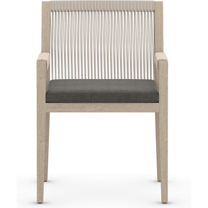 Sherwood Dining Armchair, Washed Brown by Four Hands. Made from 100% olefin, solid fsc®-certified teak, 100% polypropylene in a cottage & farmhouse style.