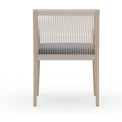 Sherwood Dining Armchair, Washed Brown by Four Hands. Made from 100% olefin, solid fsc®-certified teak, 100% polypropylene in a cottage & farmhouse style.