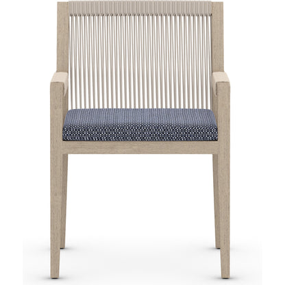 Sherwood Dining Armchair, Washed Brown by Four Hands. Made from 100% olefin, solid fsc®-certified teak, 100% polypropylene in a cottage & farmhouse style.