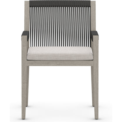 Sherwood Outdoor Dining Armchair, Weathered Grey by Four Hands. Made from 100% olefin, solid fsc®-certified teak, 100% polypropylene in a coastal style.