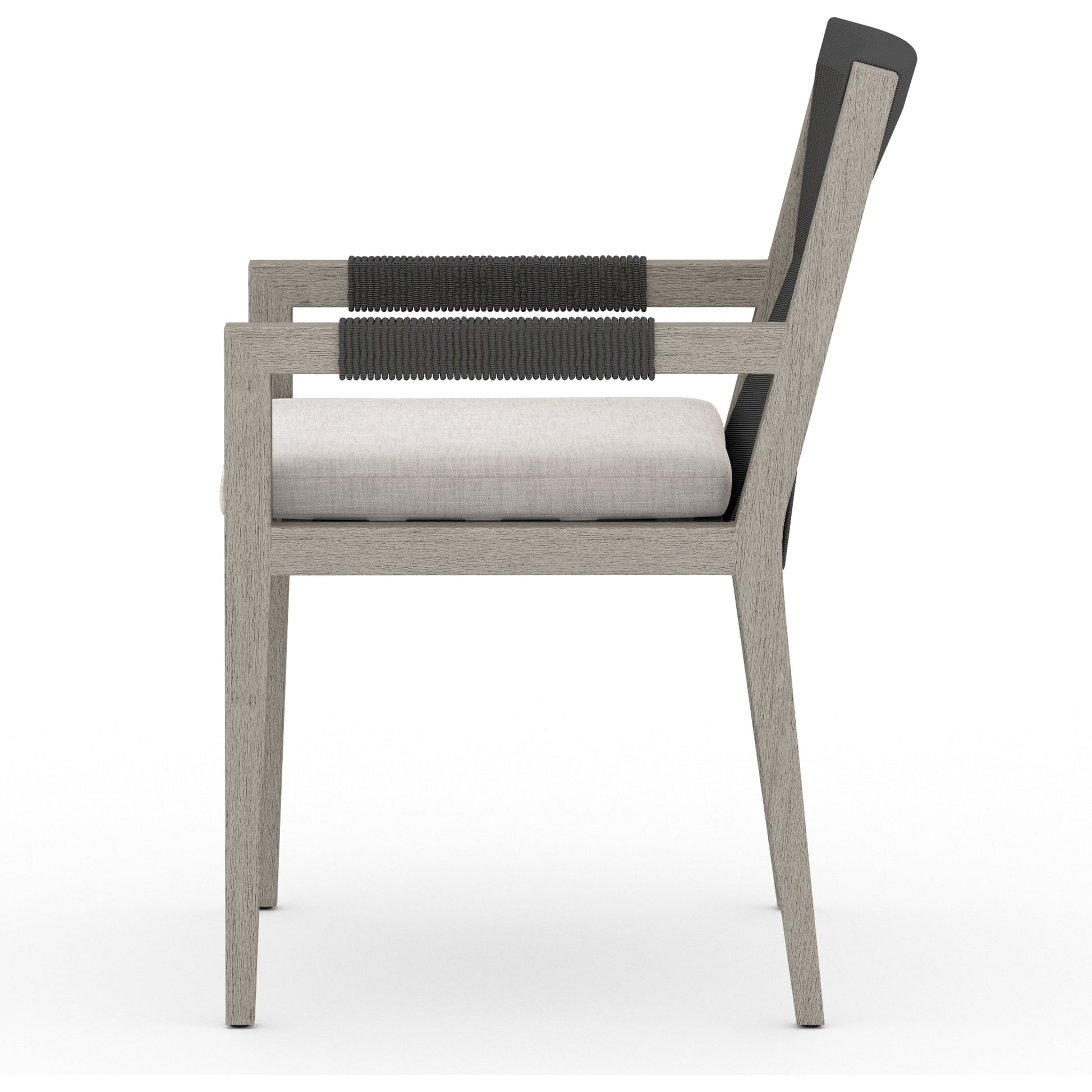 Sherwood Outdoor Dining Armchair, Weathered Grey by Four Hands. Made from 100% olefin, solid fsc®-certified teak, 100% polypropylene in a coastal style.