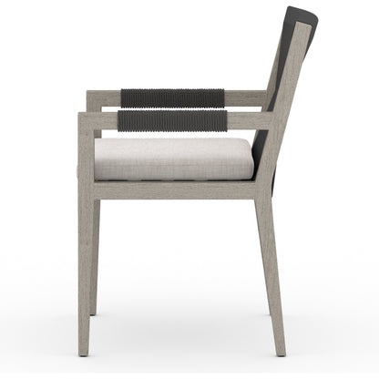 Sherwood Outdoor Dining Armchair, Weathered Grey by Four Hands. Made from 100% olefin, solid fsc®-certified teak, 100% polypropylene in a coastal style.