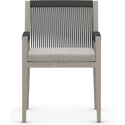 Sherwood Outdoor Dining Armchair, Weathered Grey by Four Hands. Made from 100% olefin, solid fsc®-certified teak, 100% polypropylene in a coastal style.