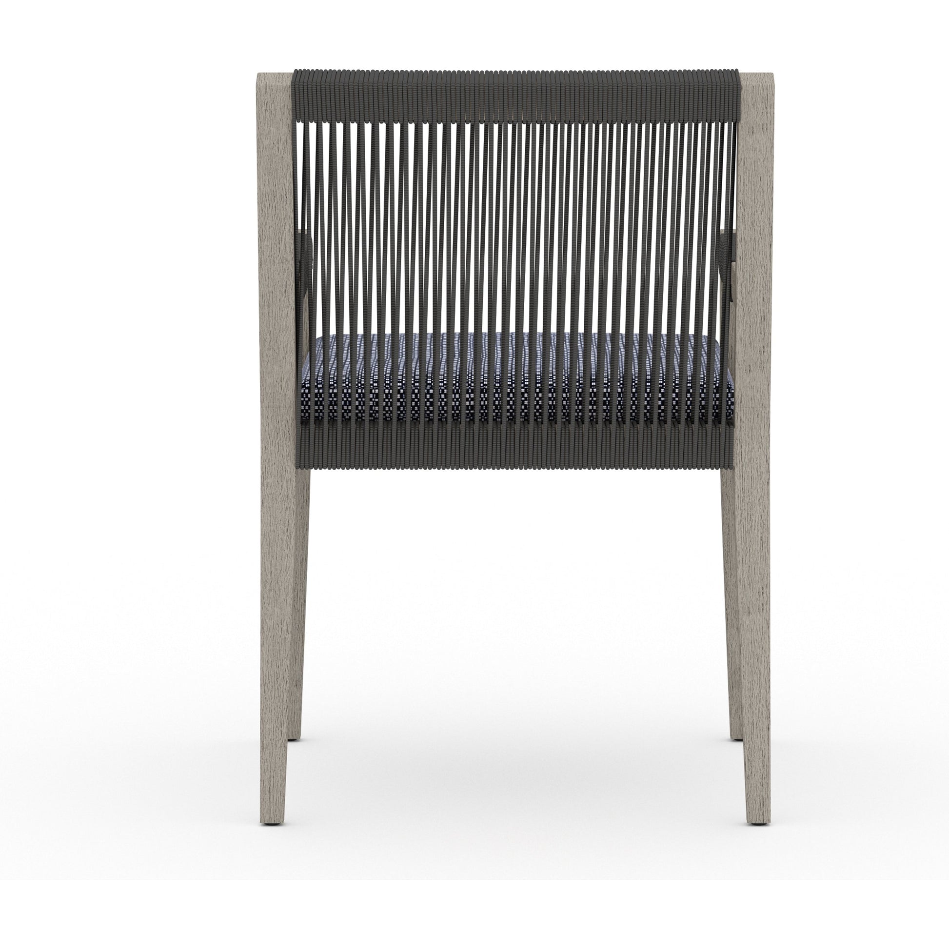 Sherwood Outdoor Dining Armchair, Weathered Grey by Four Hands. Made from 100% olefin, solid fsc®-certified teak, 100% polypropylene in a coastal style.
