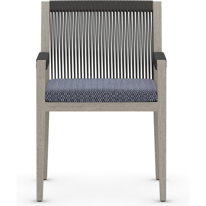 Sherwood Outdoor Dining Armchair, Weathered Grey by Four Hands. Made from 100% olefin, solid fsc®-certified teak, 100% polypropylene in a coastal style.