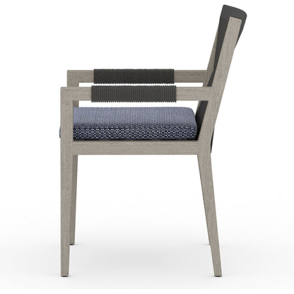 Sherwood Outdoor Dining Armchair, Weathered Grey by Four Hands. Made from 100% olefin, solid fsc®-certified teak, 100% polypropylene in a coastal style.