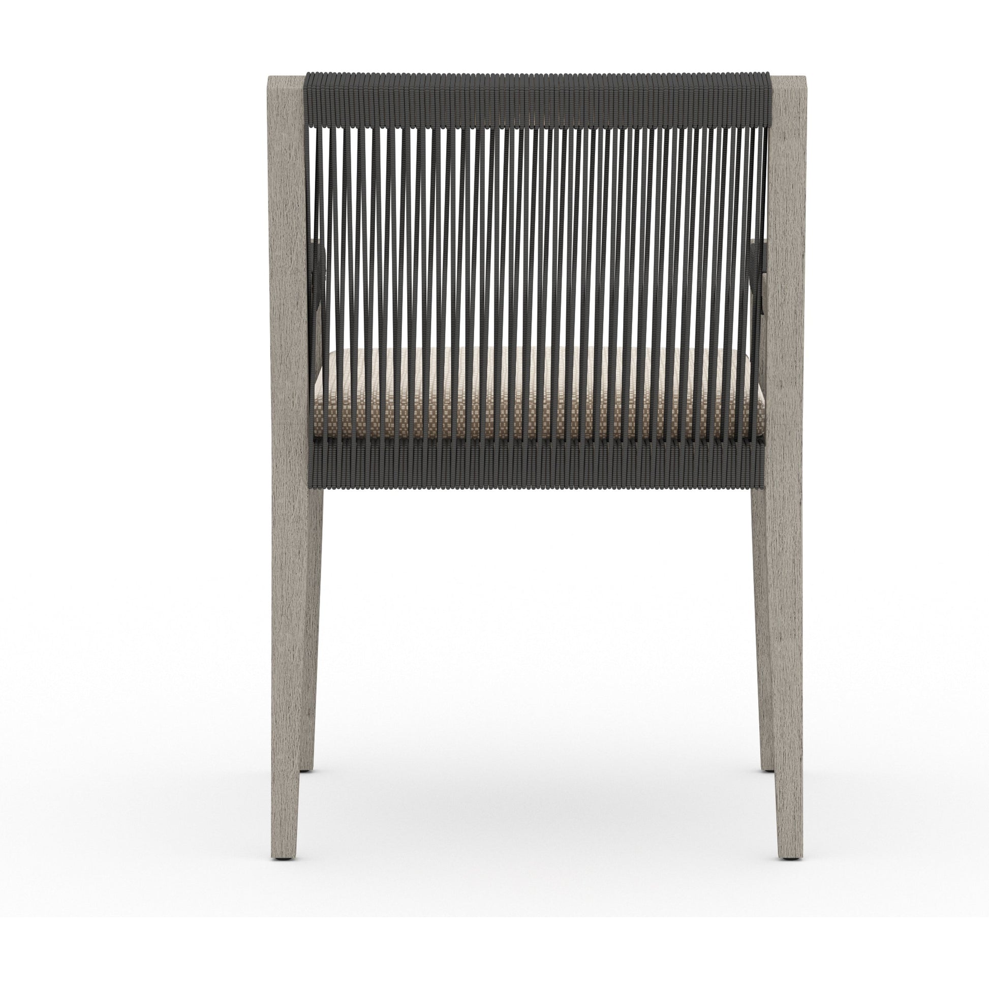 Sherwood Outdoor Dining Armchair, Weathered Grey by Four Hands. Made from 100% olefin, solid fsc®-certified teak, 100% polypropylene in a coastal style.