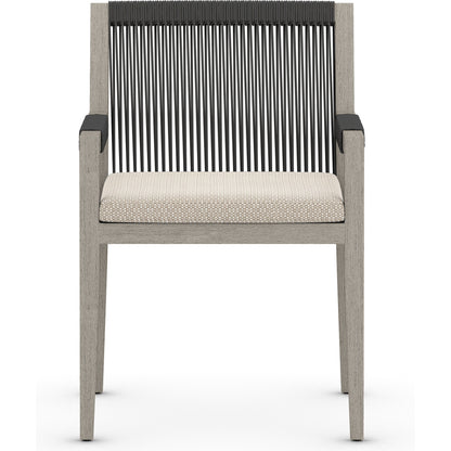 Sherwood Outdoor Dining Armchair, Weathered Grey by Four Hands. Made from 100% olefin, solid fsc®-certified teak, 100% polypropylene in a coastal style.