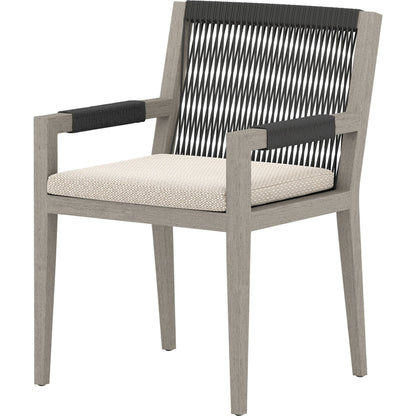 Sherwood Outdoor Dining Armchair, Weathered Grey by Four Hands. Made from 100% olefin, solid fsc®-certified teak, 100% polypropylene in a coastal style.